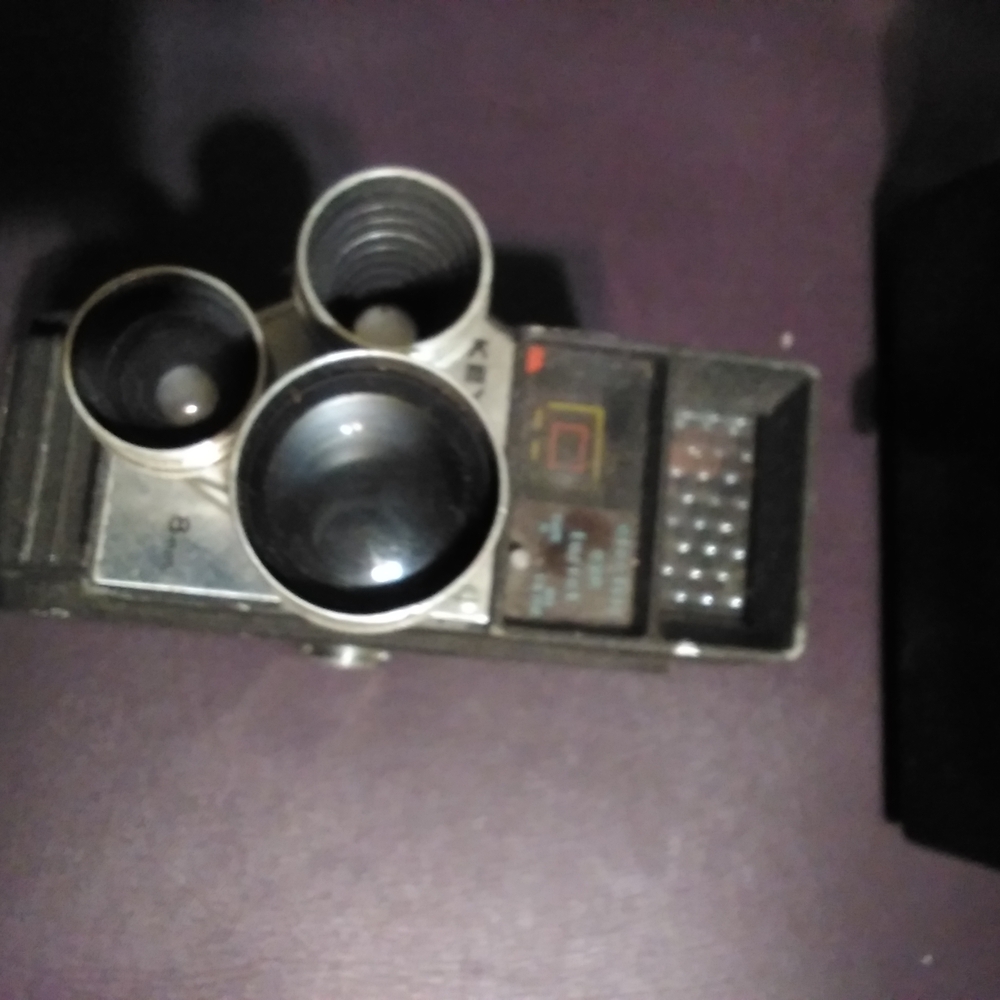 Vintage Camera with Triple Lens System - Black and Silver